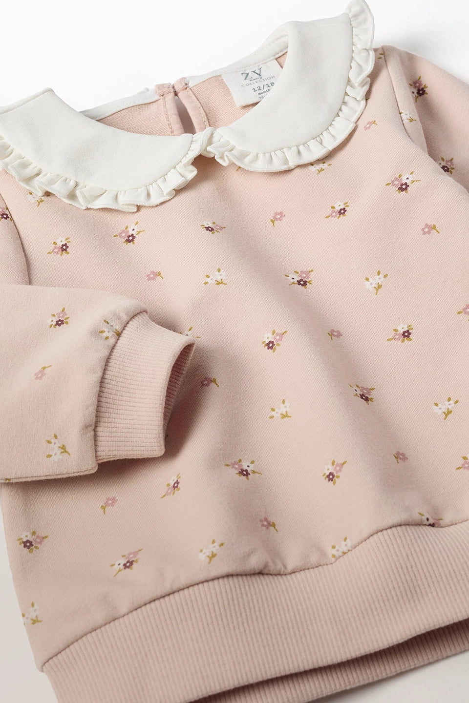 Conjunto sudadera y pantalón fleece claro bebé niña