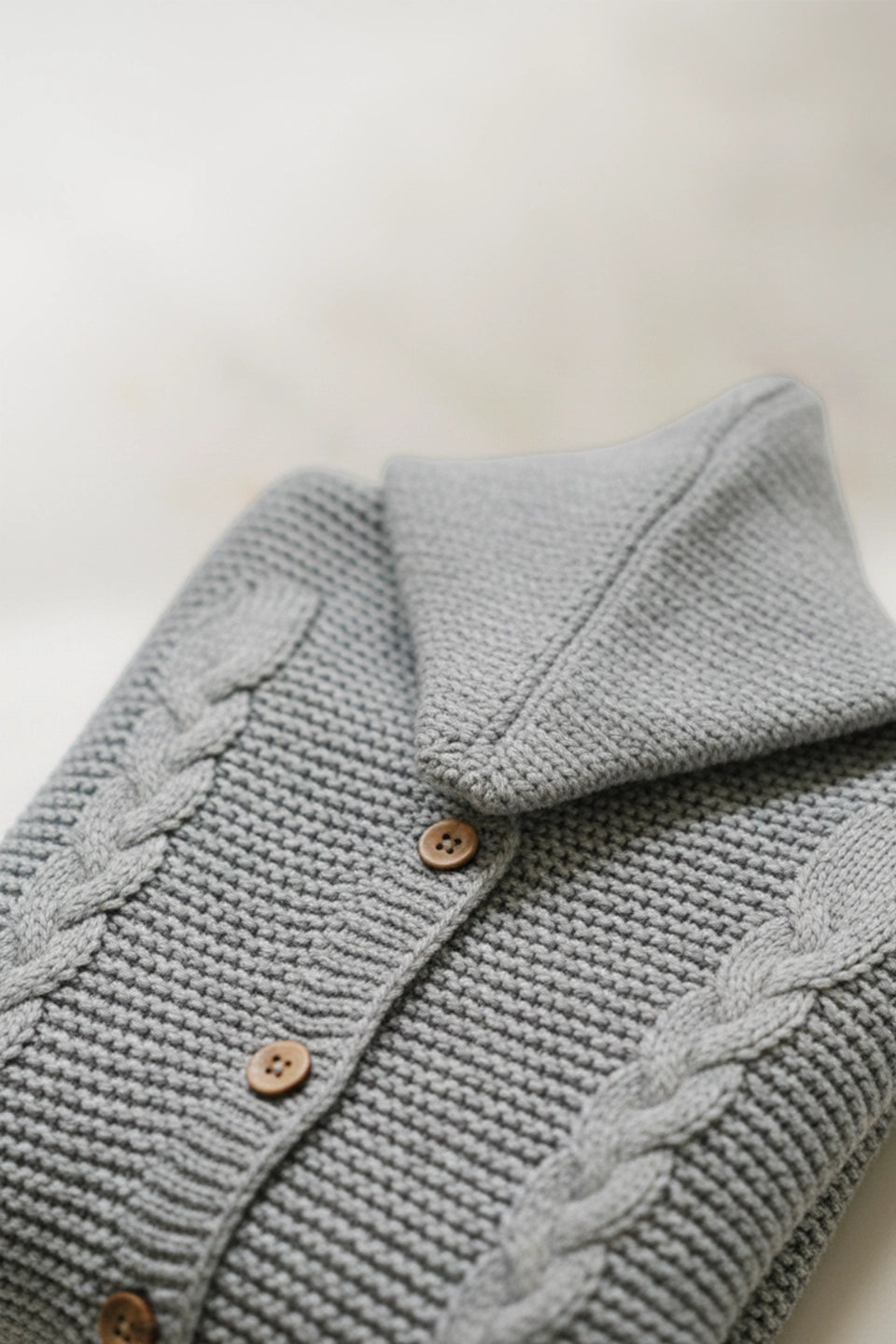 Buzo punto gris claro