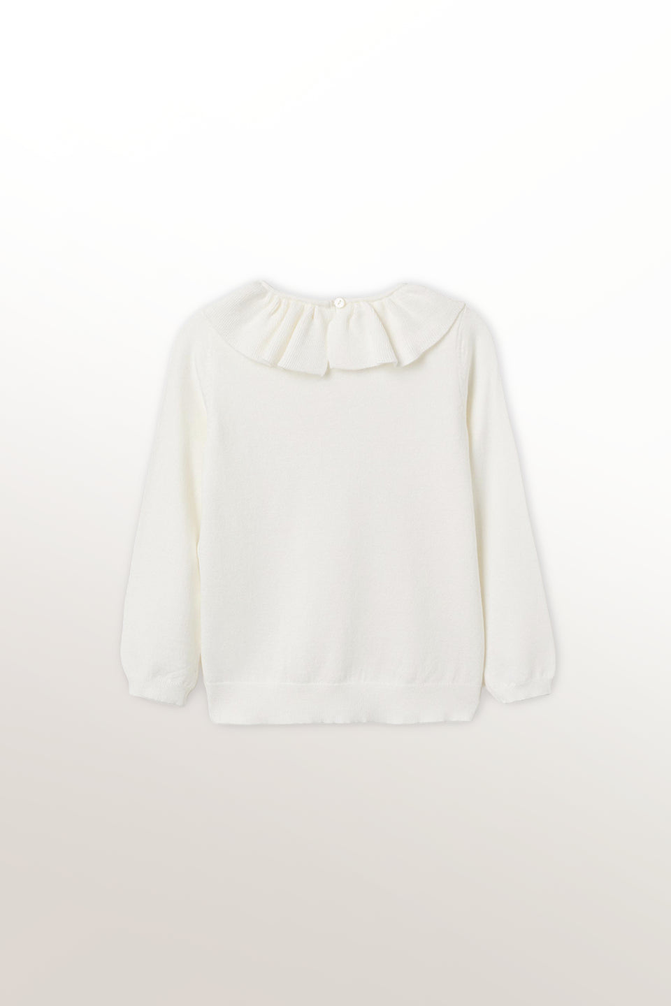 Jersey de punto con volante blanco niña