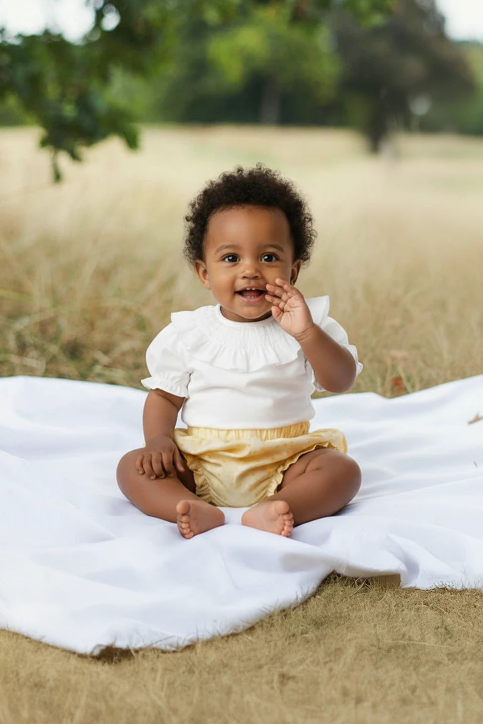 Braguita cubrepañal amarilla