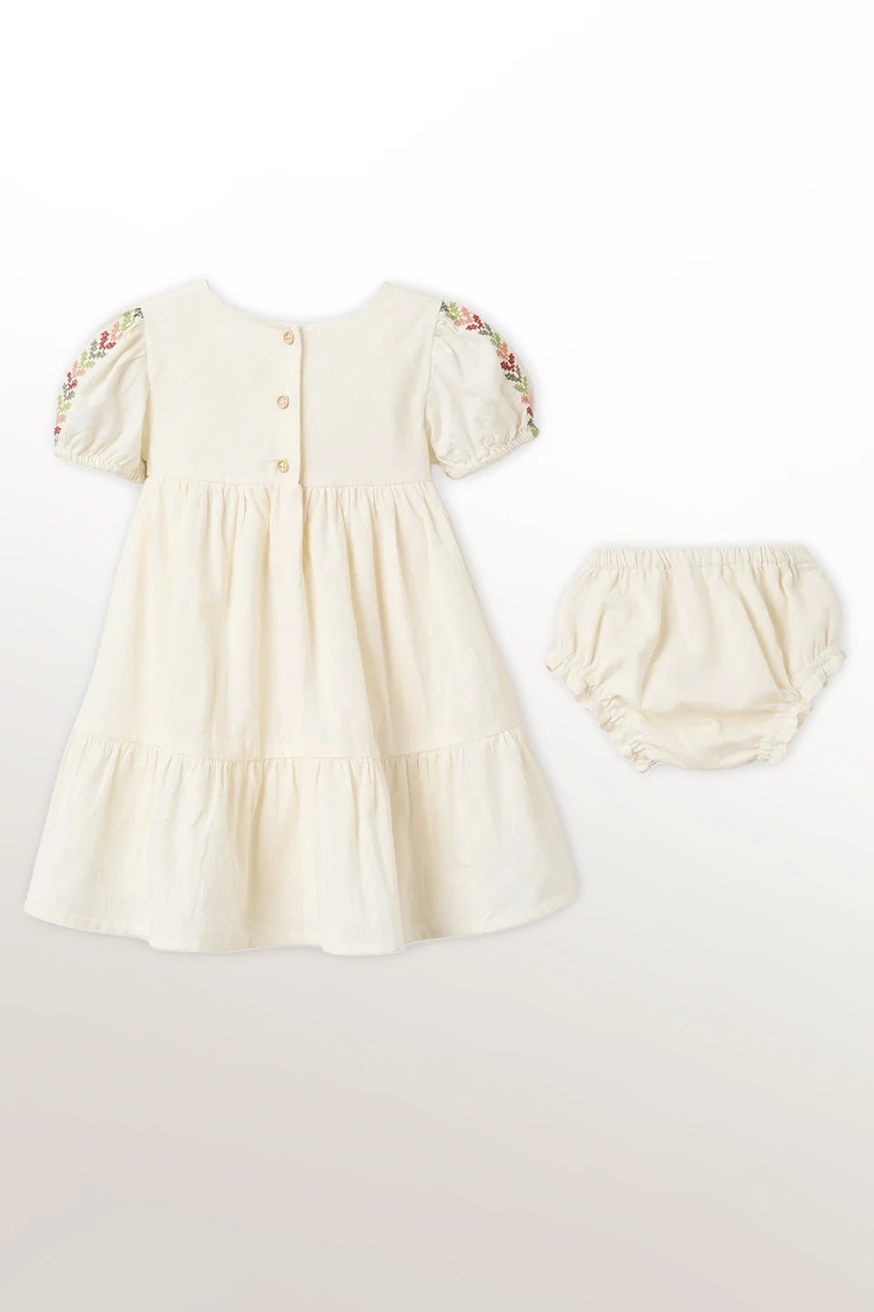 Vestido de lino con bordado + cubrepañal
