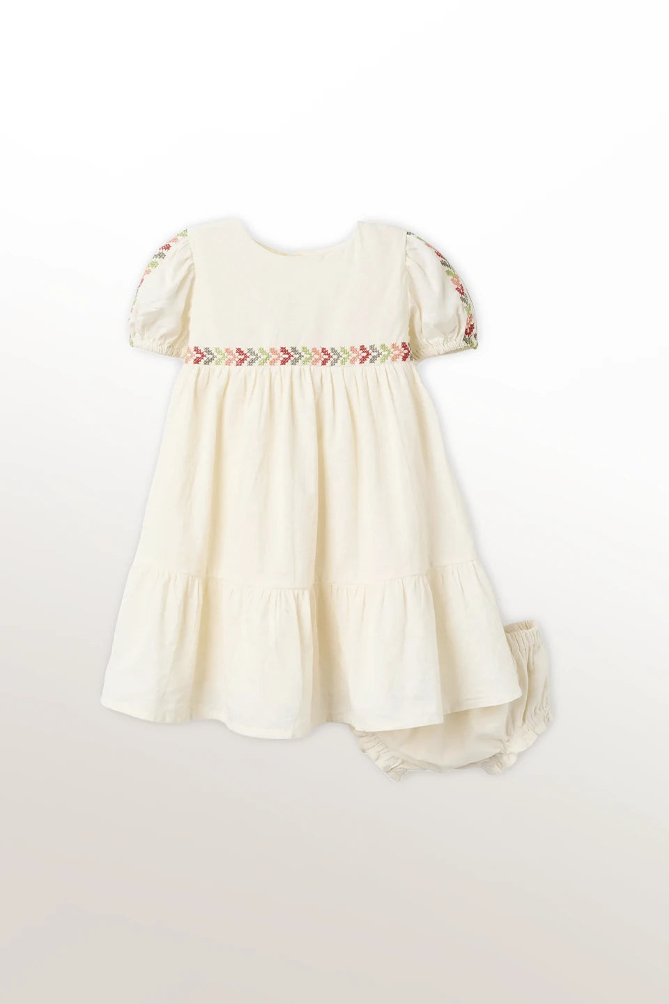 Vestido de lino con bordado + cubrepañal
