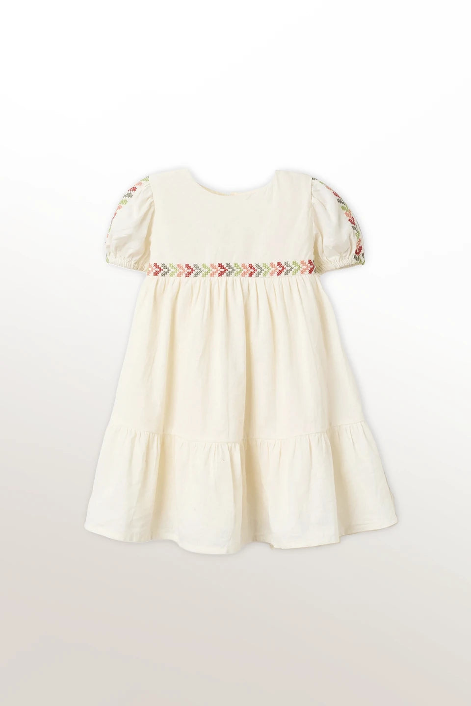 Vestido de lino con bordado + cubrepañal